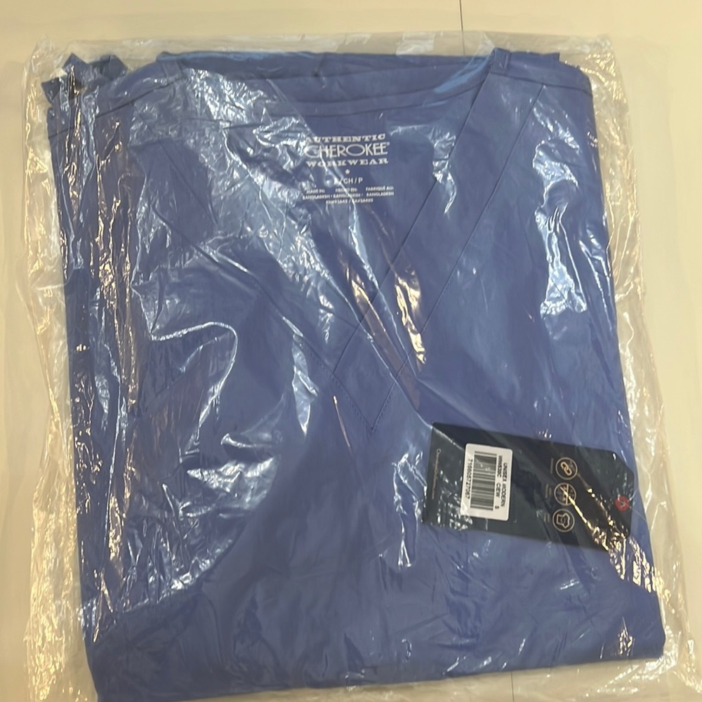 Small light blue scrub top
